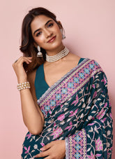 Teal colour saree looking fashionable